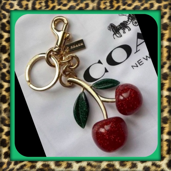 👑✅PRICE FIRM✅ COACH Cherry Keychain with Green Leaf Accents - Picture 1 of 9